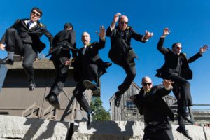 flying groomsmen at mystic seaport